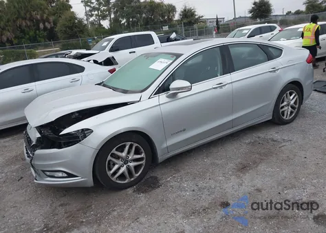 2018 Ford Fusion Hybrid Titanium from USA, damaged, VIN 3FA6P0RU5JR143495